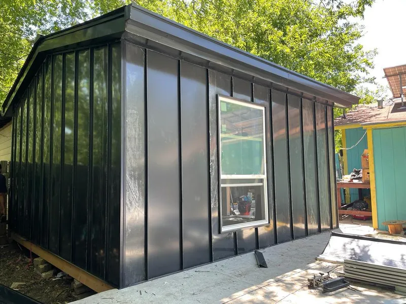Black standing seam metal wall panels for Metal Roof Installation in Oakleaf Plantation