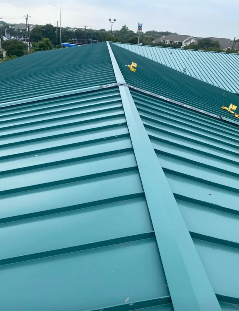 Green commercial metal roof ridge and valley for Metal Roof Repair in Oakleaf Plantation